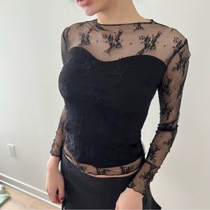 Vintage unique black top with lace detail